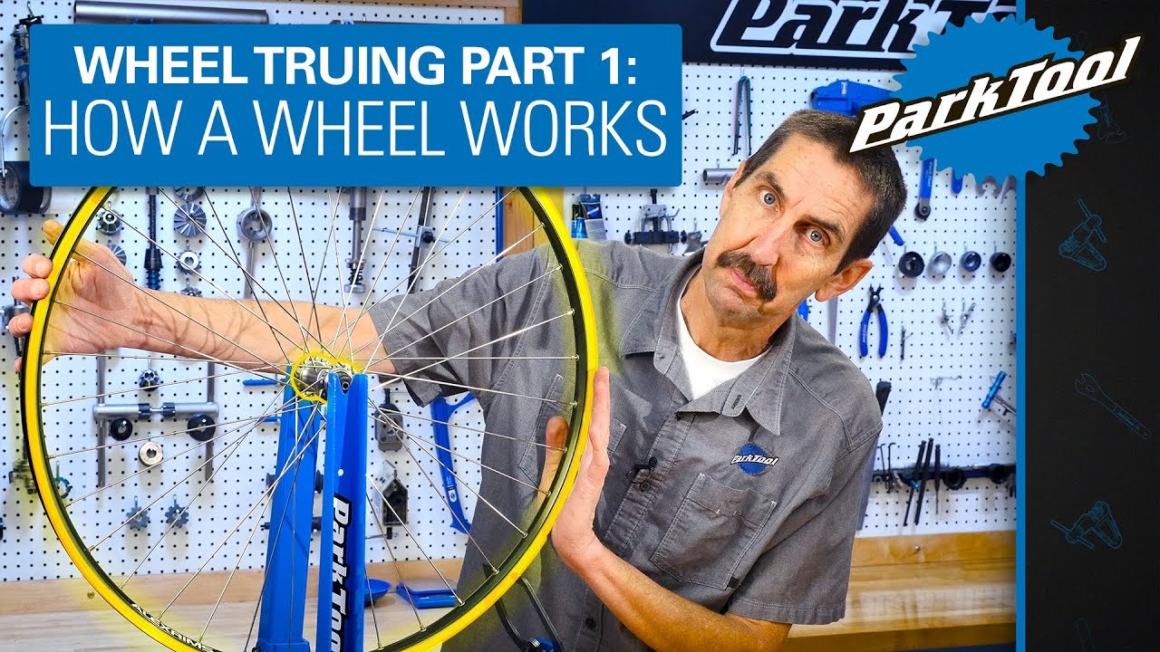 Intro card for Wheel Truing Repair Help with Calvin Jones holding wheel in truing stand