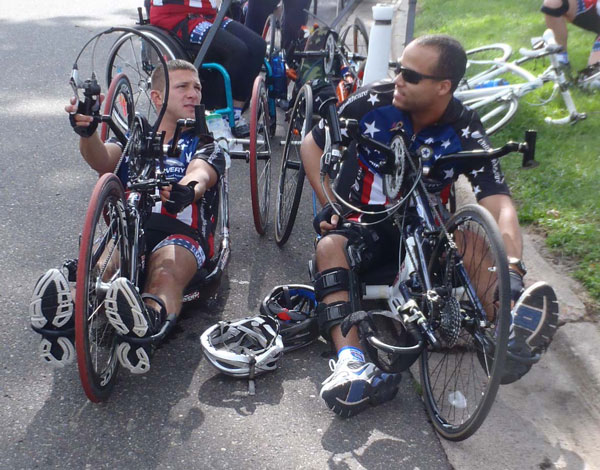 Hand cyclists Nathan Hunt and David Wascam ready themselves for the ride
