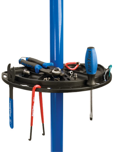 The half circle Park Tool 104 Work Tray on repair stand filled with tools, click to enlarge