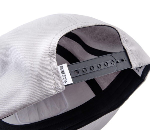Closeup of the Park Tool HAT-10 Light Gray Snapback Hat snapback strap with embroidered Park Tool logo tab, click to enlarge