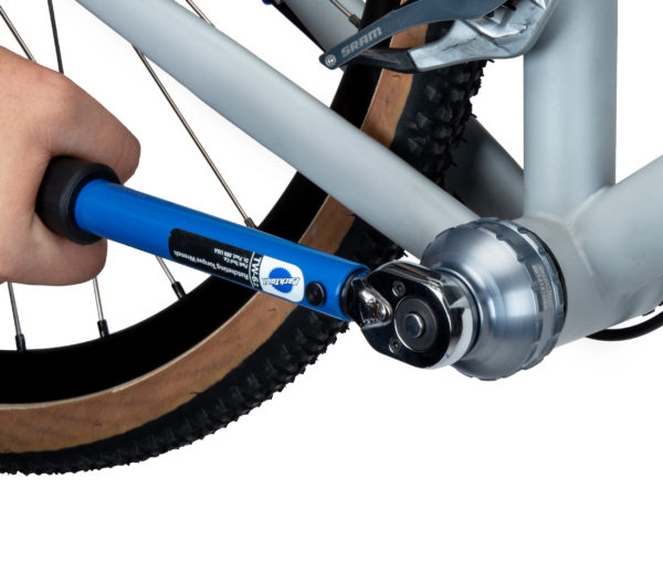 The BBT-27.3 Bottom Bracket Tool tightening an external cup on a bike frame using the TW-6.2 torque wrench, click to enlarge