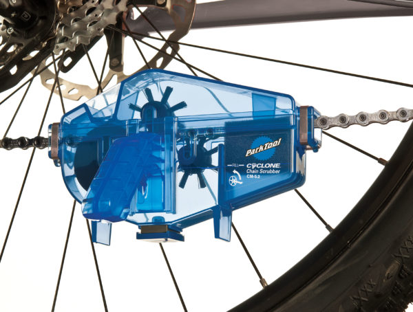 The Park Tool CM-5.2 Cyclone™ Chain Scrubber installed on bicycle chain, click to enlarge