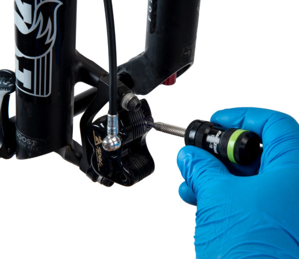 The DTD-10 T10 Precision Torx®-Compatible Driver tightening a bleed port on a front disc brake caliper, click to enlarge