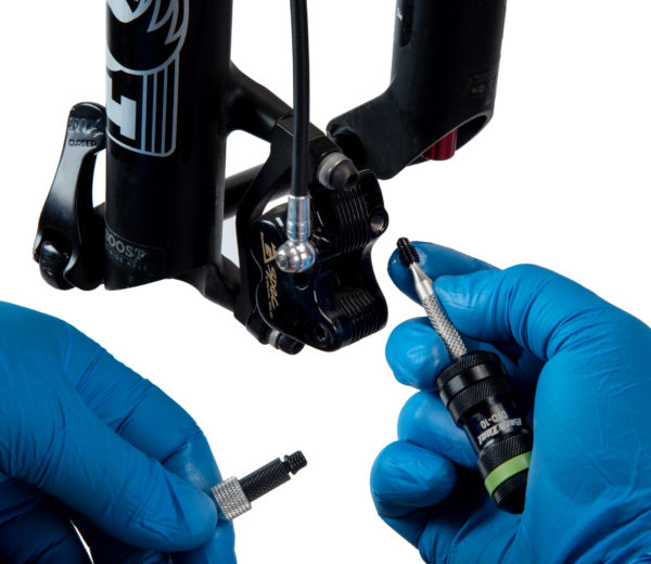 The DTD-10 T10 Precision Torx®-Compatible Driver loosening a bleed port on a front disc brake caliper, click to enlarge