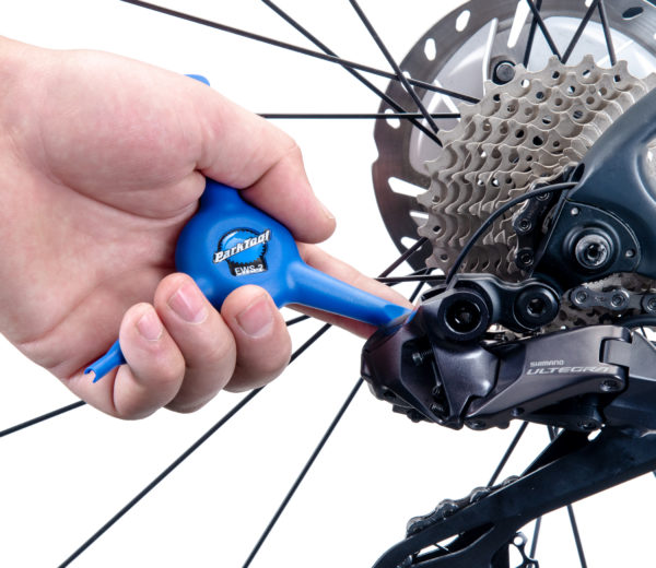The Park Tool EWS-2 removing an E-tube® cord from a Di2® rear derailleur, click to enlarge