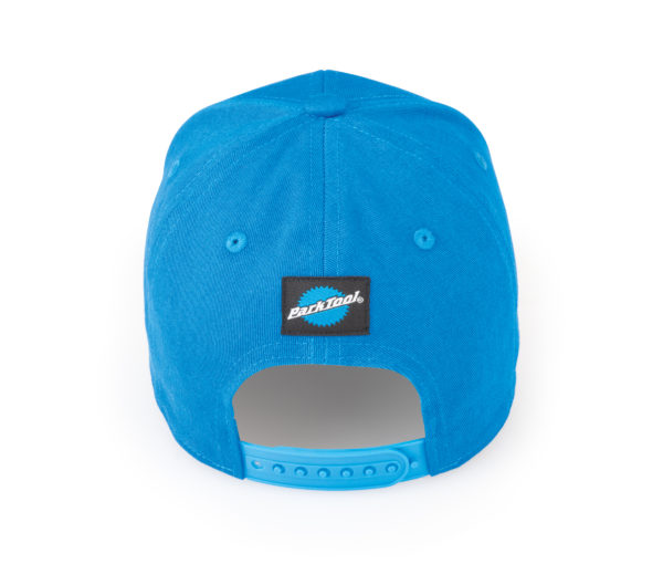 Back of a blue baseball hat with a small back patch with the Park Tool logo above the adjustment strap, click to enlarge