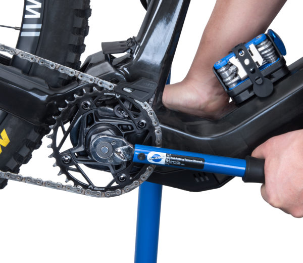 The Park Tool LRT-5 lockring tool installed on a TW-6.2 torque wrench, securing a Fazua® Ride 60 chainring lockring, click to enlarge