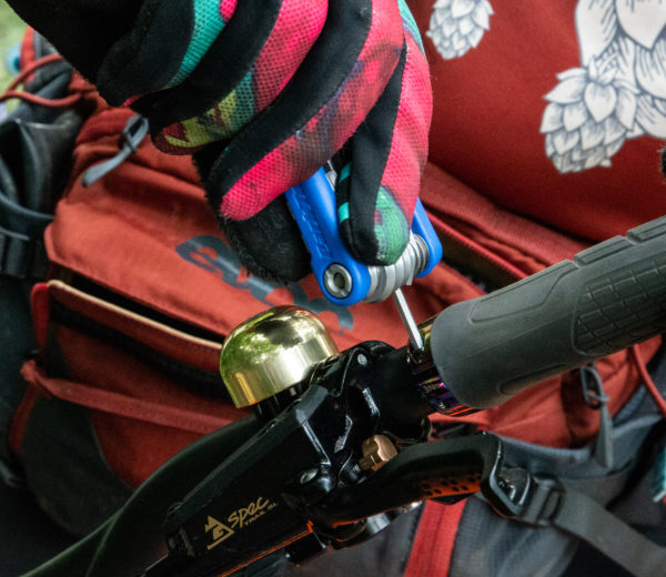 The Park Tool MTB-5 Rescue Tool being used to secure bolt on handlebar grip lockring, click to enlarge