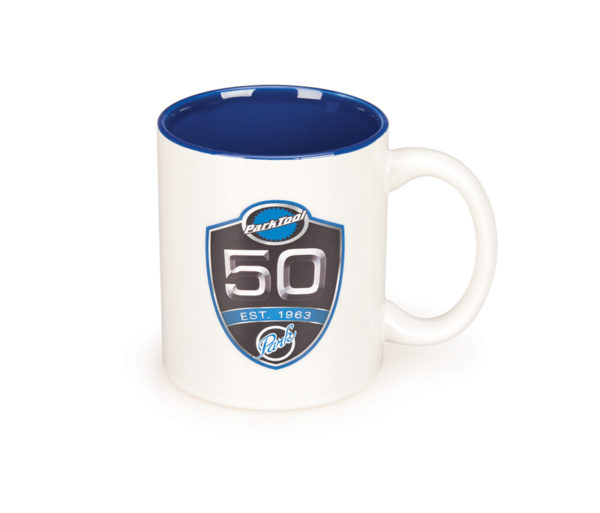 Park Tool MUG-50 50th Anniversary Coffee Mug with blue inner and white outer featuring 50th Anniversary crest, click to enlarge