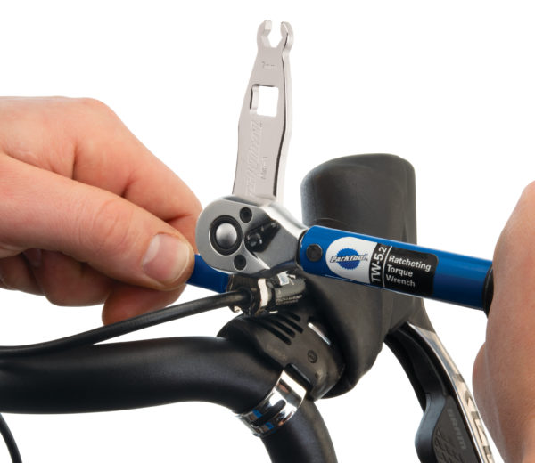 The MWF-3 Metric Flare Wrench tightening a brake hose fitting on brake levers using a TW-5.2 torque wrench, click to enlarge