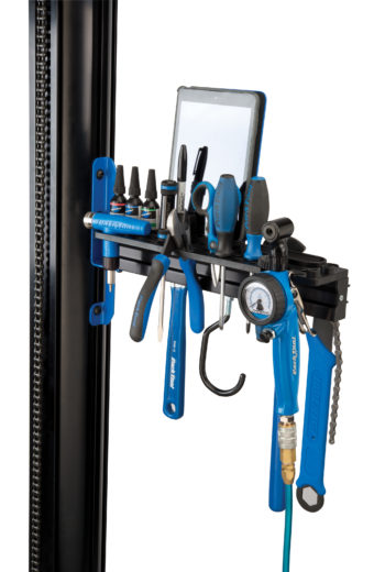 The Park Tool PRS-33TT Deluxe Tool and Work Tray full of tools and an iPad® attached to repair stand, click to enlarge