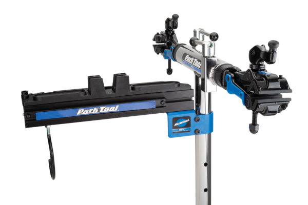 An empty Park Tool PRS-TT Deluxe Tool and Work Tray on top of a double arm Park Tool repair stand, click to enlarge