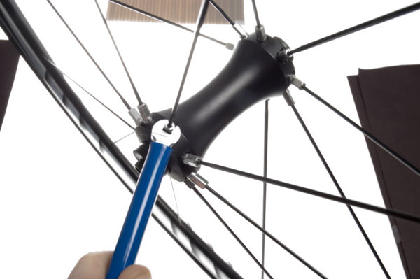 The Park Tool SW-14 Double-Ended Spoke Wrench — Shimano® engaged on Shimano® wheel nipple at the hub, click to enlarge