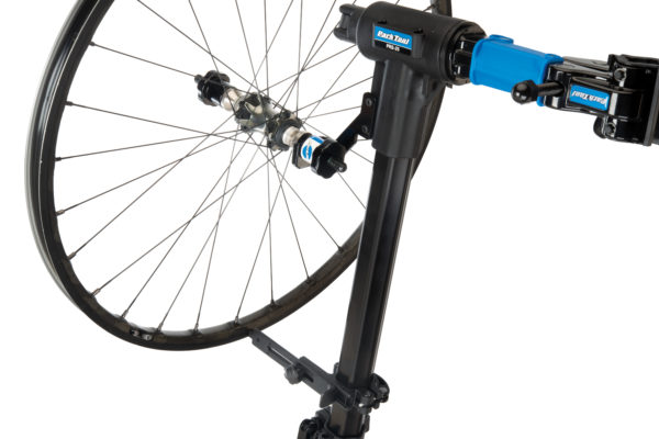 Park Tool TS-TA Thru Axle Adaptor holding a bike wheel in a TS-25 Repair Stand Mounted Wheel Truing Stand, click to enlarge