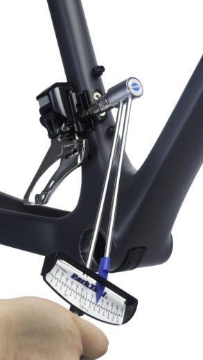 The Park Tool TW-1.2 Beam-Type Torque Wrench torquing a front derailleur mount bolt on a road bike frame, click to enlarge