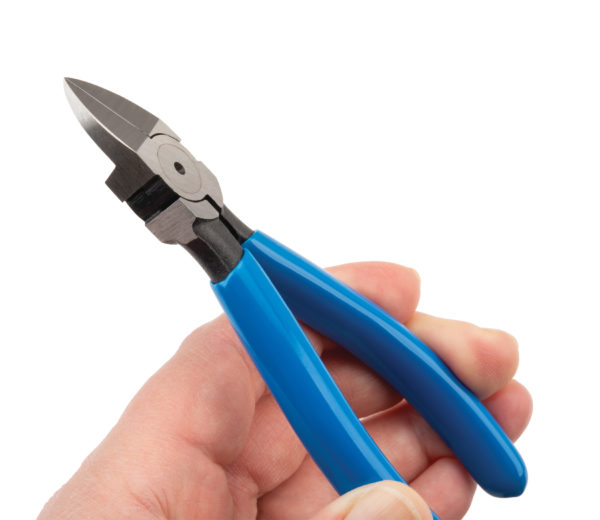 White male hand holding Park Tool ZP-5 Flush Cut Pliers, click to enlarge