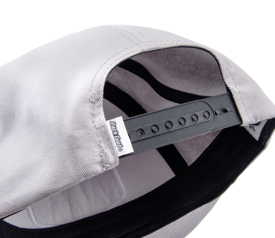 Closeup of the Park Tool HAT-10 Light Gray Snapback Hat snapback strap with embroidered Park Tool logo tab, enlarged