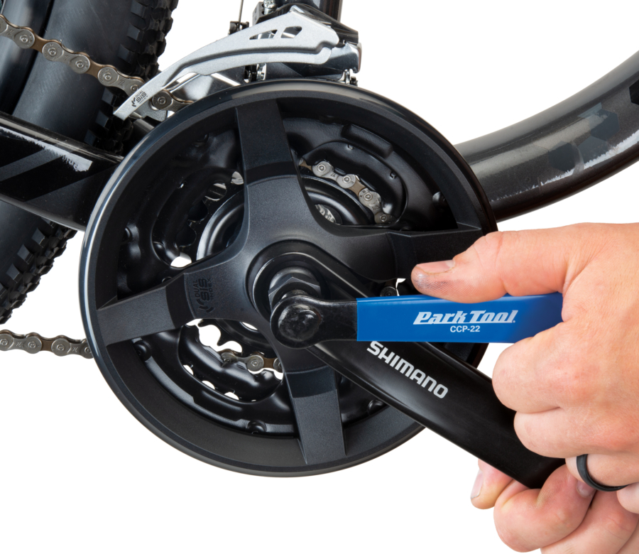 Park Tool CCP-22 Crank Puller installed in square spindle fitting, removing bike crankset, enlarged