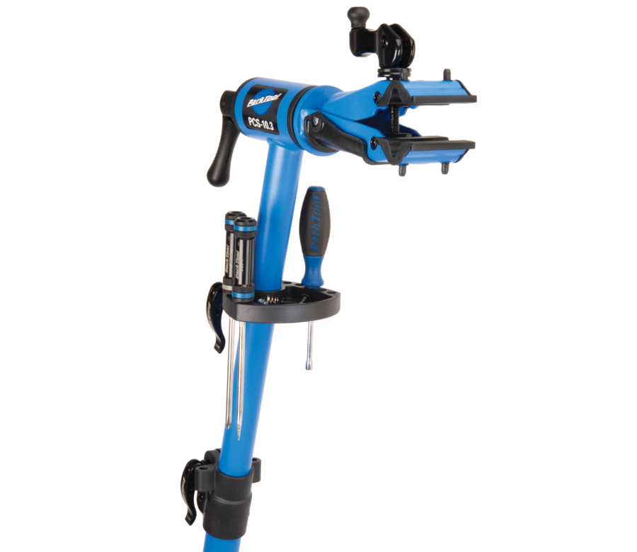 The Park Tool PCS-10.3 Deluxe Home Mechanic Repair Stand top tube with work tray installed, holding tools, enlarged