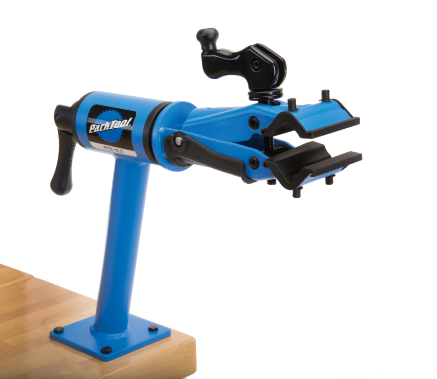 Park Tool PCS-12.2 Home Mechanic Bench Mount Repair Stand mounted to a maple workbench, enlarged