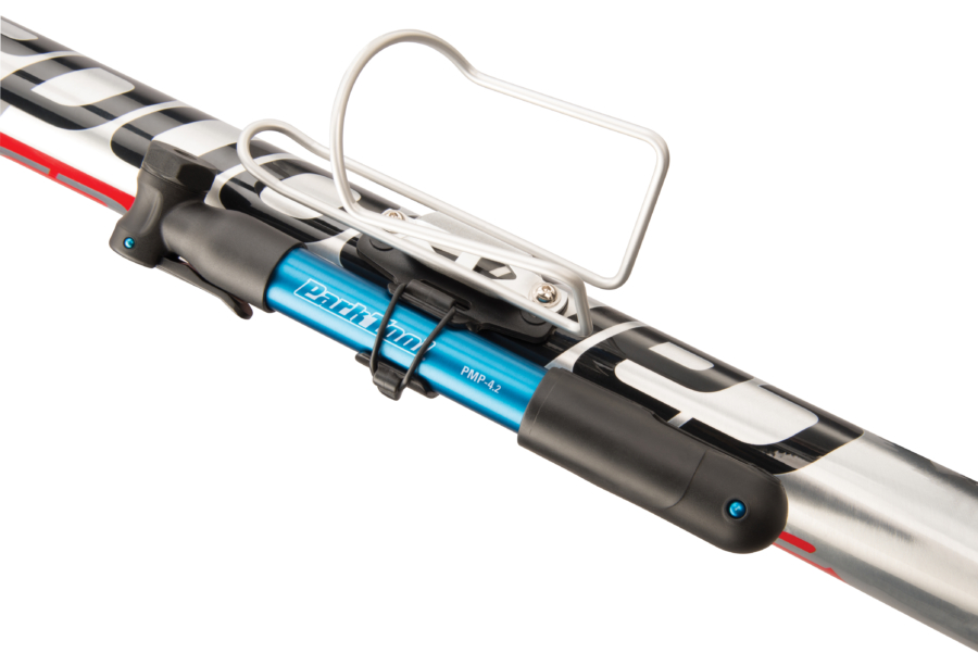 The Park Tool PMP-4.2 Mini Pump in blue attached to bike frame, enlarged
