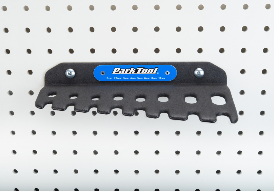 Park Tool THH 1 Sliding T-Handle Hex Wrench Set holder on a pegboard, enlarged