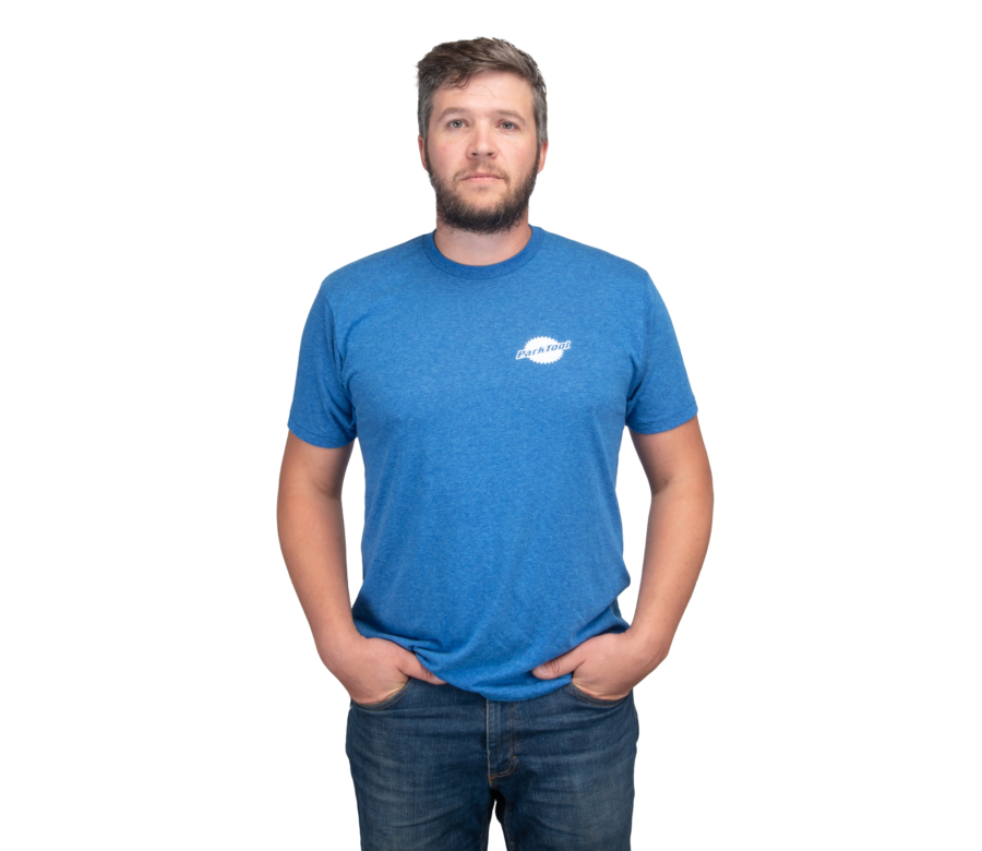 The Park Tool TSM-1 Metal to the Pedal T-Shirt worn by a male model, front, enlarged