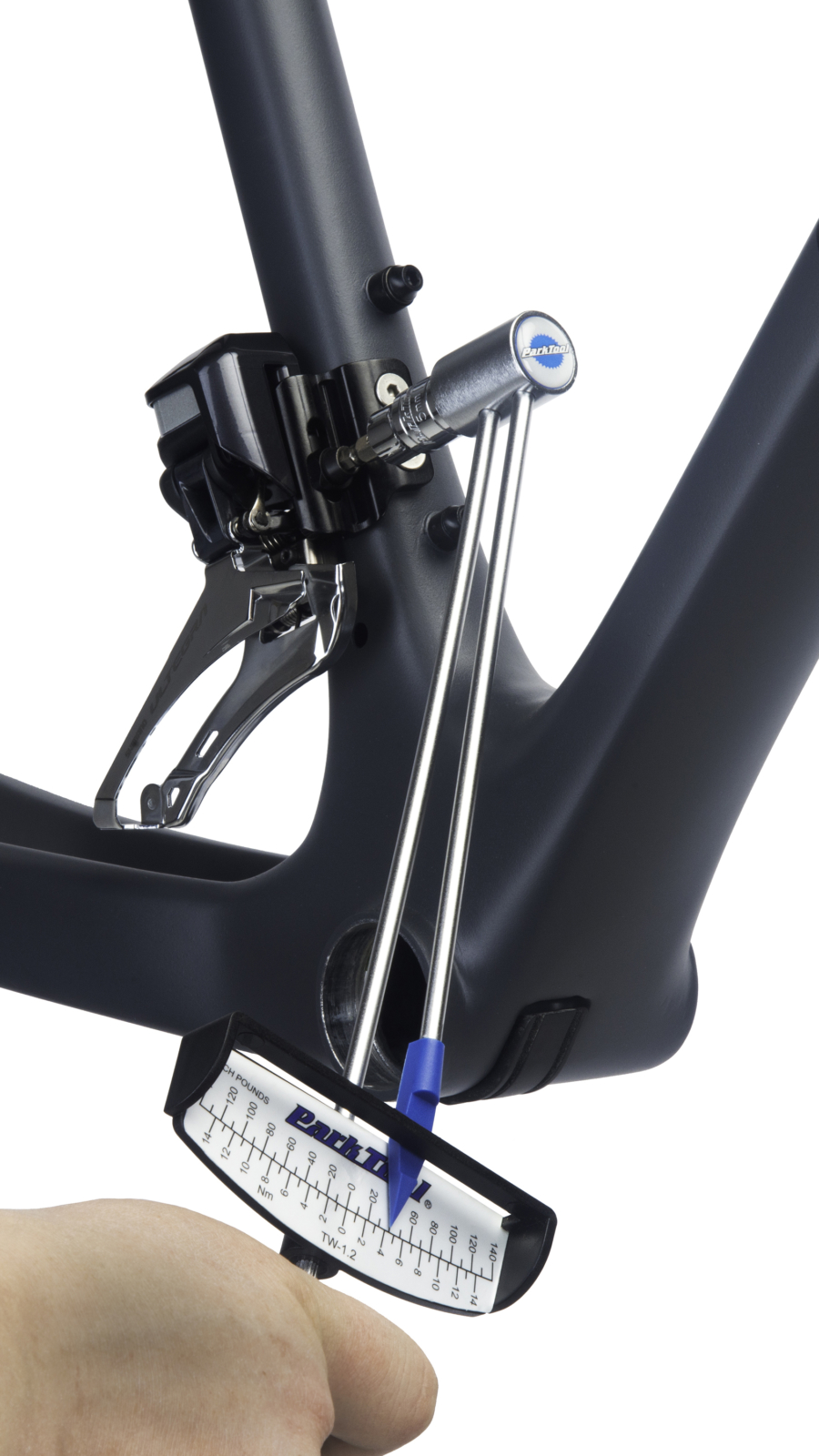 The Park Tool TW-1.2 Beam-Type Torque Wrench torquing a front derailleur mount bolt on a road bike frame, enlarged