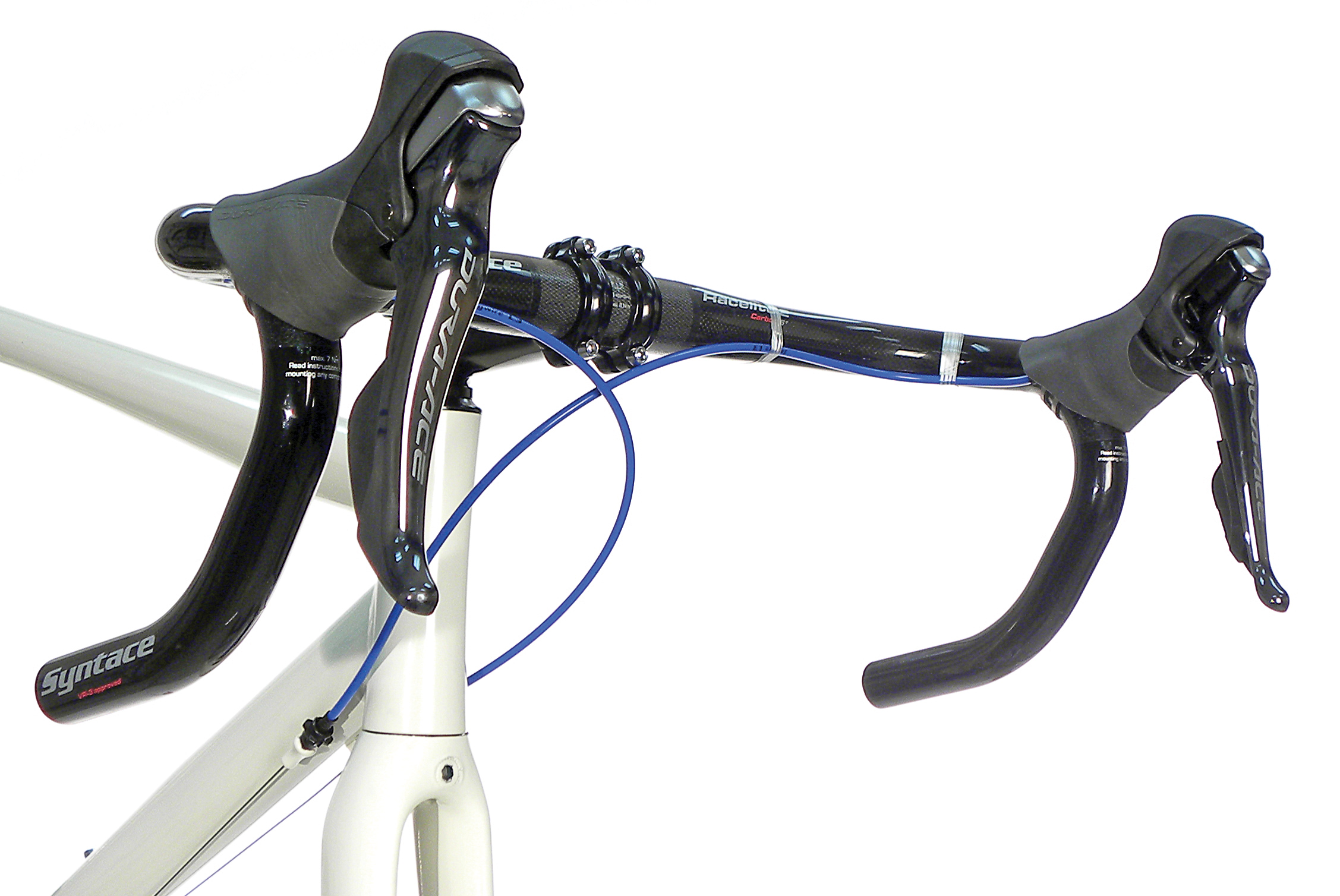 Example of crossed-over shift housing. The housings form smooth arcs that allow for full handlebar rotation without excess housing.