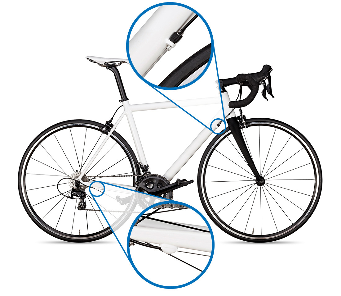 Bicycle with segmented housing. The housing ends at the housing stops, and the cable continues until the next