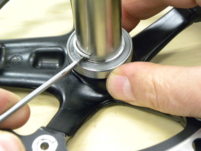 Figure 1. Carefully work free the C-clip on the drive side crank