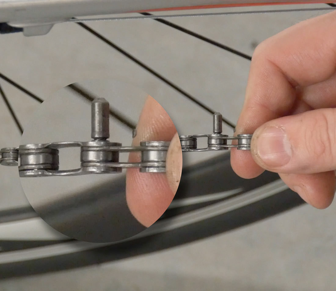 Drive connecting rivet into chain