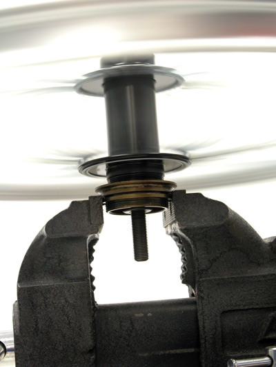 Turn wheel counter-clockwise to unthread freewheel inner body