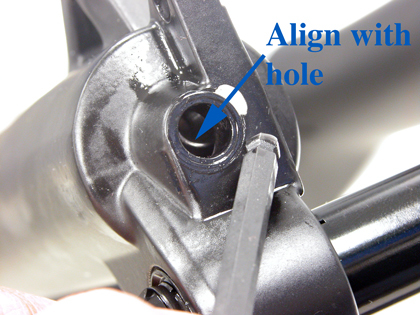 Figure 12. Push inner shaft to align with hole before installing bolt