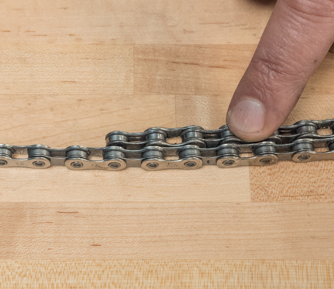 Match rivets on used chain to new chain