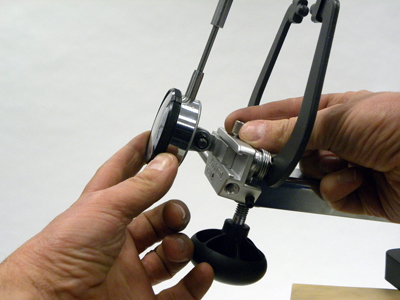 Figure 8. Installing the radial dial bracket onto the mounting bracket